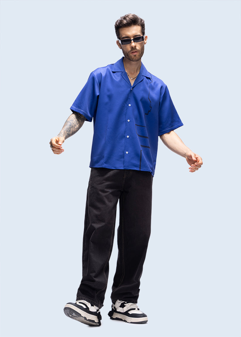 Model in blue party T-shirt